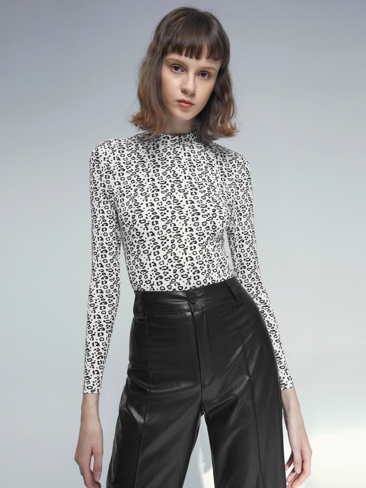 Black and White Spotted Mockneck Long Sleeve Top