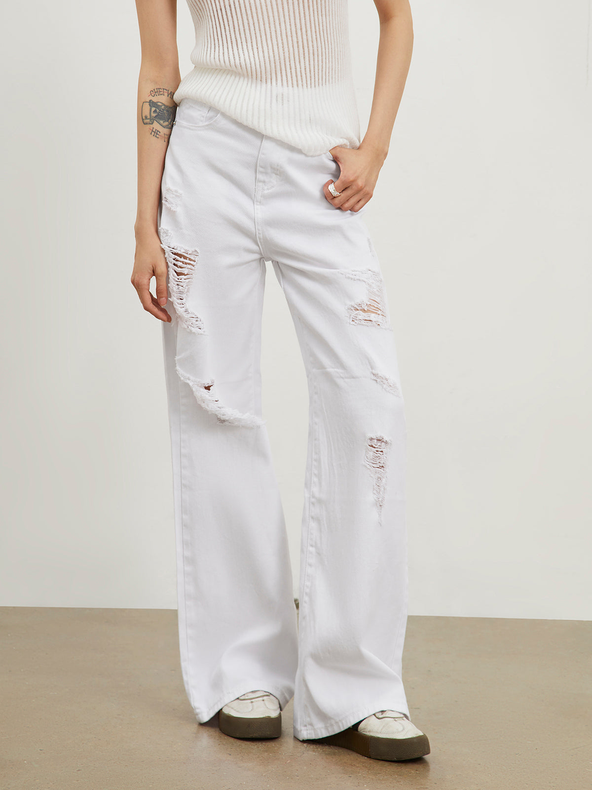 Ripped White Denim Straight Leg Jeans